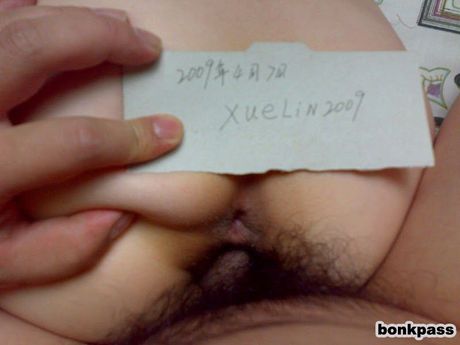 Cocky Chinese dude showing off his naked girlfriend