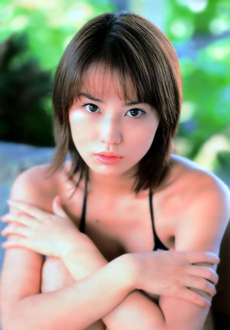 Sultry and sexy asian babe enjoying herself in her bikini