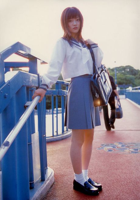 Adorable gravure school girl with pink deliciously kissable lips