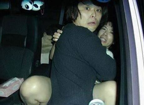 Couples caught pants down