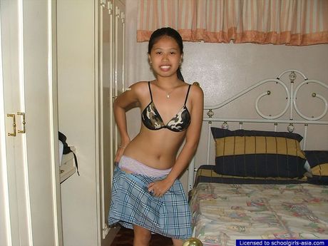 College student stripping and spreading to show her shaved holes