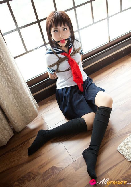 Dimdim Asian in school uniform is tied in ropes and can´t scream