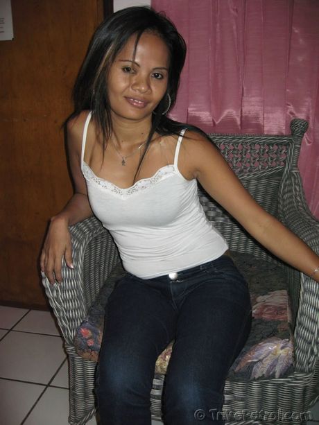 Asian mommy Maureen strips and shows her tiny tits and pink pussy