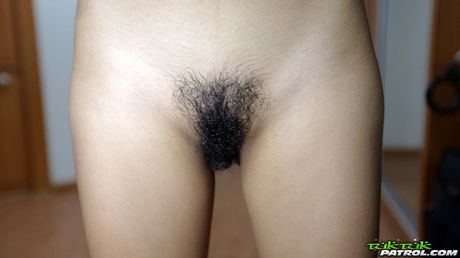 Asian babe Game shows her tattooed body and toys her pussy in a solo