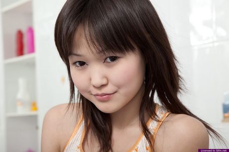 Asian amateur girl with small tits and a perfect ass strips and showers naked