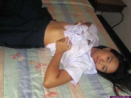 Japanese amateur chick strips and masturbates with a sex toy