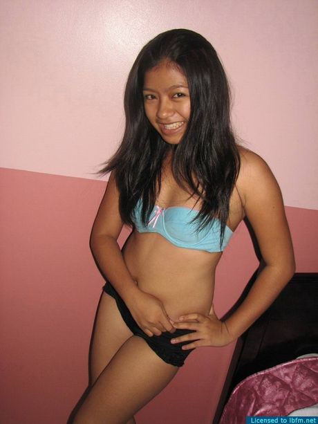 Amateur Asian girl strips and washes her hairy pussy in the shower