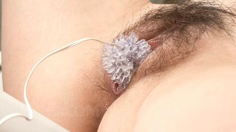 Naho Kojima Asian with ropes around cans is fucked with sex toys