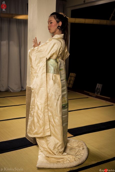 Japanese babe strips off and bares her tiny tits and pussy