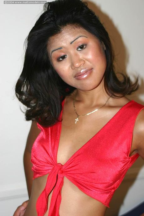 Asian teen Asia strips and shows her big boobs and ass in a solo