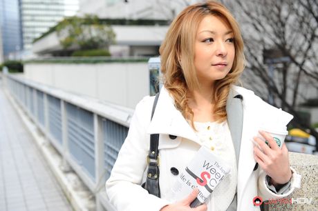 Beautiful office lady Nao posing outdoors with so much pleasure