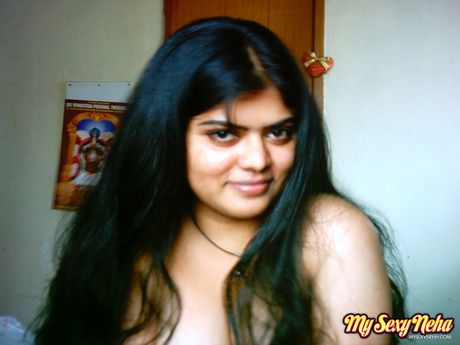 Asian amateur Neha Nair unveils her tiny tits and toys her pussy