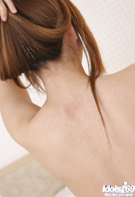 Hot japanese teen Nami posing in hot pantyhose on camera