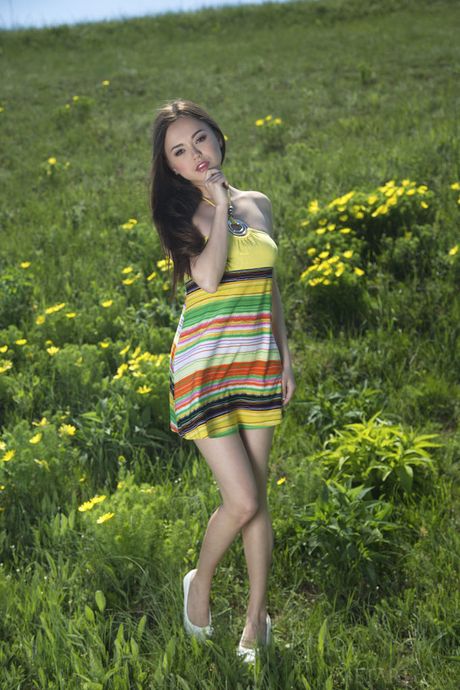 Slender asian dark-haired teen Li Moon in nice skirt likes foot fetish outdoor